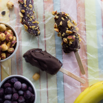 Kick your chocolate covered bananas up a notch with a layer of sweet blueberry! Add chopped hazelnuts and you've got a total winner. Try these today! - OCD Kitchen
