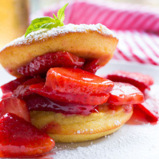 A gluten free strawberry shortcake with a cornbread cake that's been soaked with a homemade basil syrup. Easy to make even easier to eat!